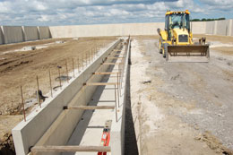 Grain storage building trench installation
